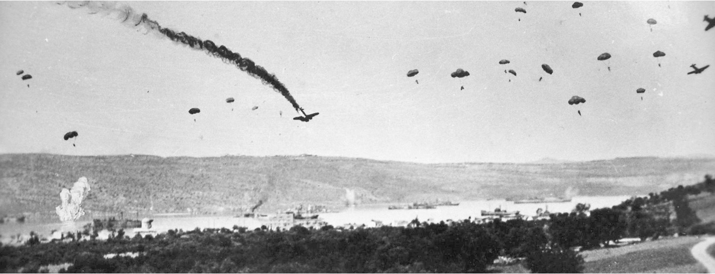 German paratroops parachuting onto the village of Suda. (AWM P00433.009)